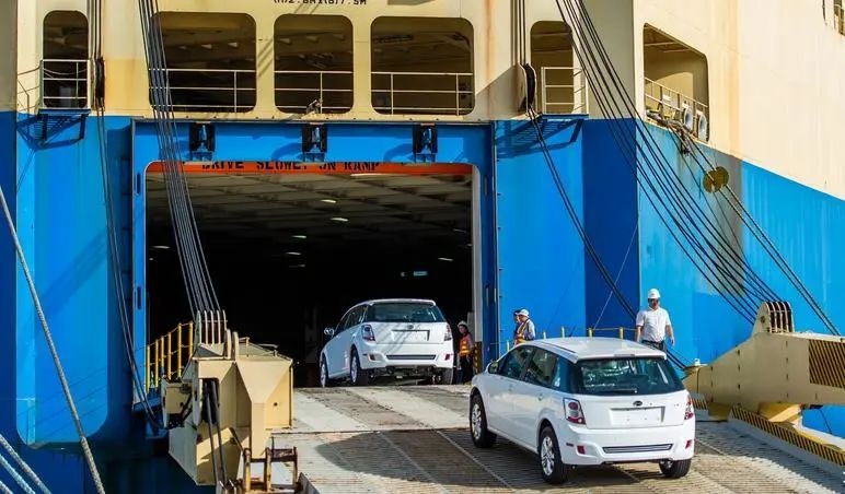 Why do car companies get together in Thailand?