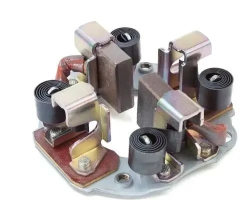 Several parameters affecting the normal application of motor brushes