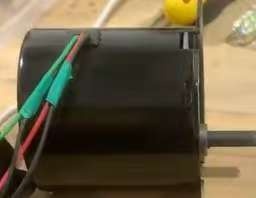 In a motor bearing system, how should the fixed-end bearing be selected and matched?